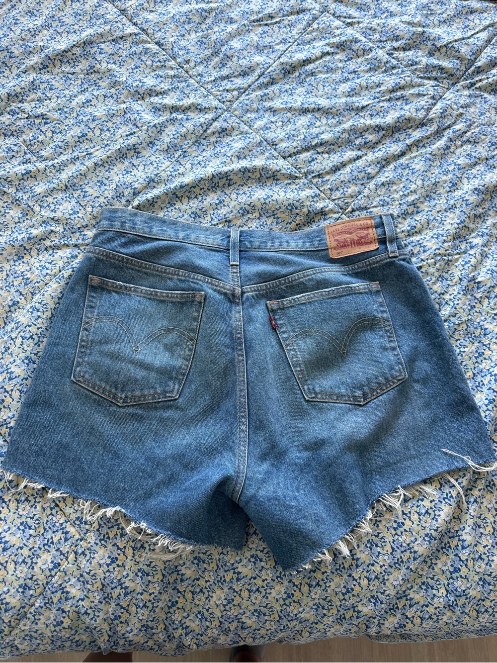 Levi's Medium Blue Denim Cutoff Shorts with Frayed Hem